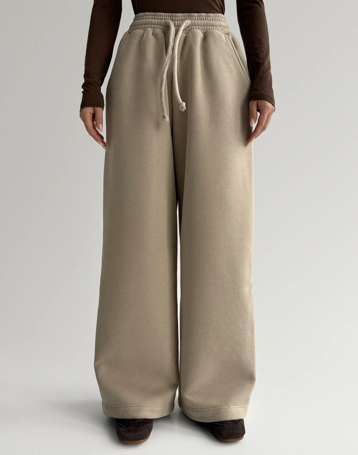 Штани з начосом на затяжках по низу, лате - Фото 1