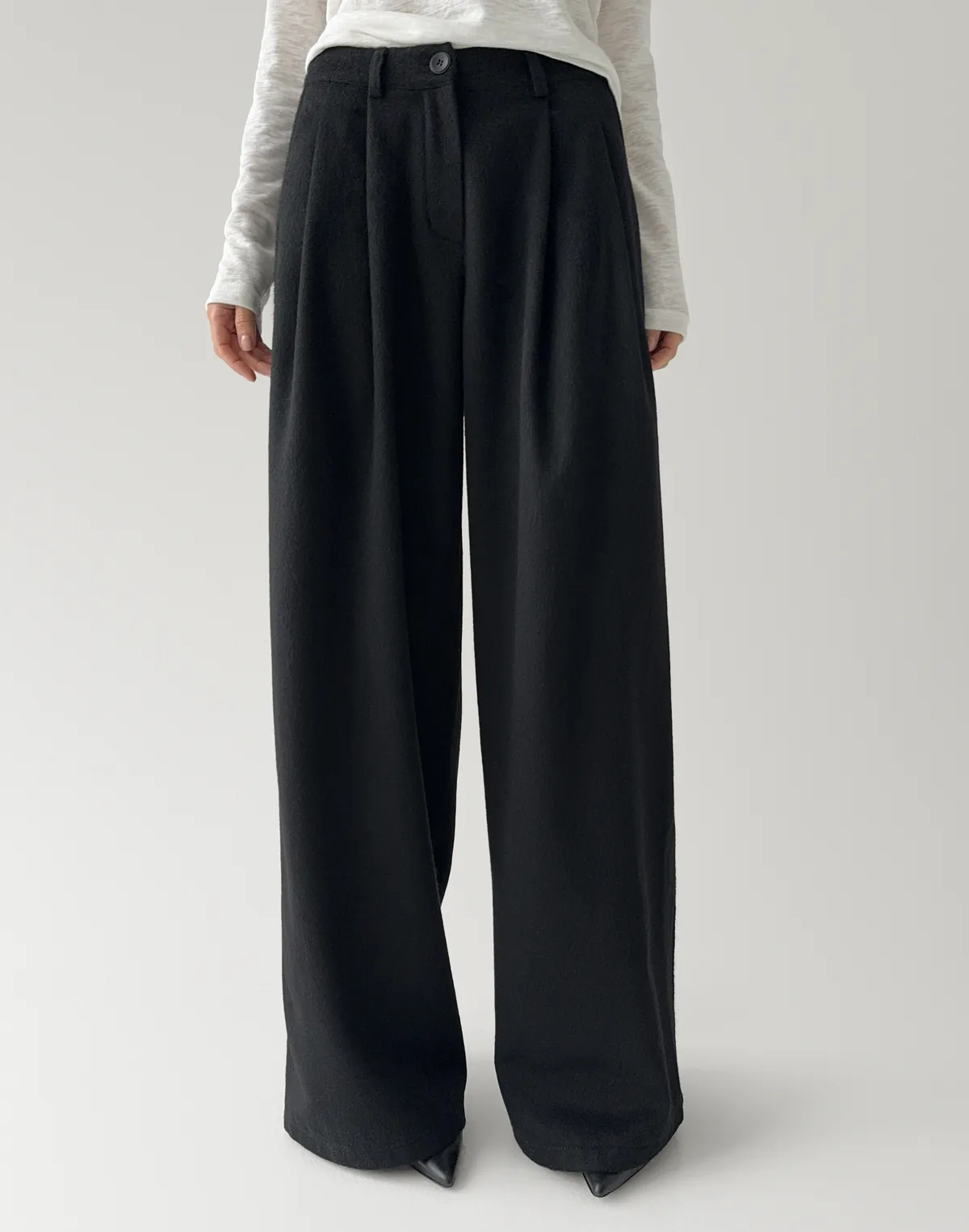 Zimowe spodnie oversize z 40% wełny, czarny - Фото 1