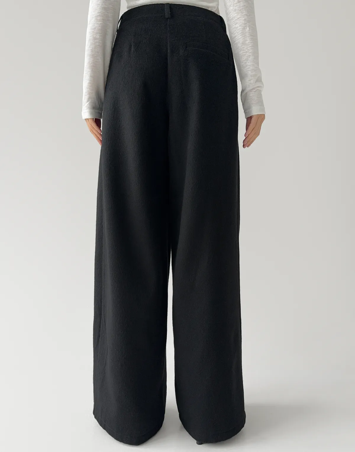 Zimowe spodnie oversize z 40% wełny, czarny - Фото 2