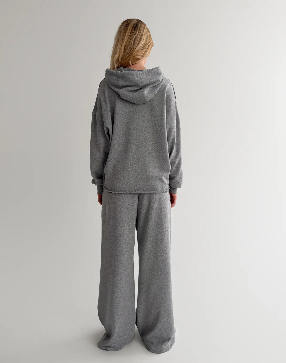 Комплект зіпер з декоративними швами та штани з декоративними кишенями позаду, сірий меланж - Фото 2