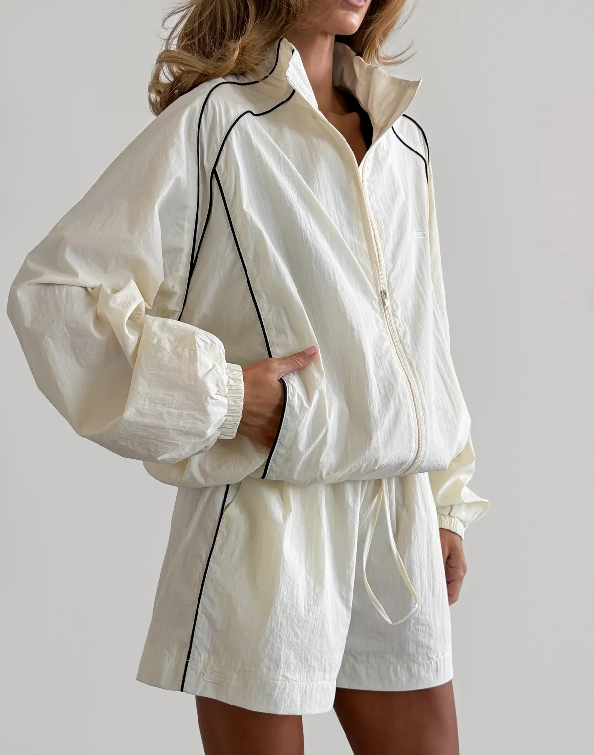 Зіпер з кантом з плащової тканини, молочний - Фото 6