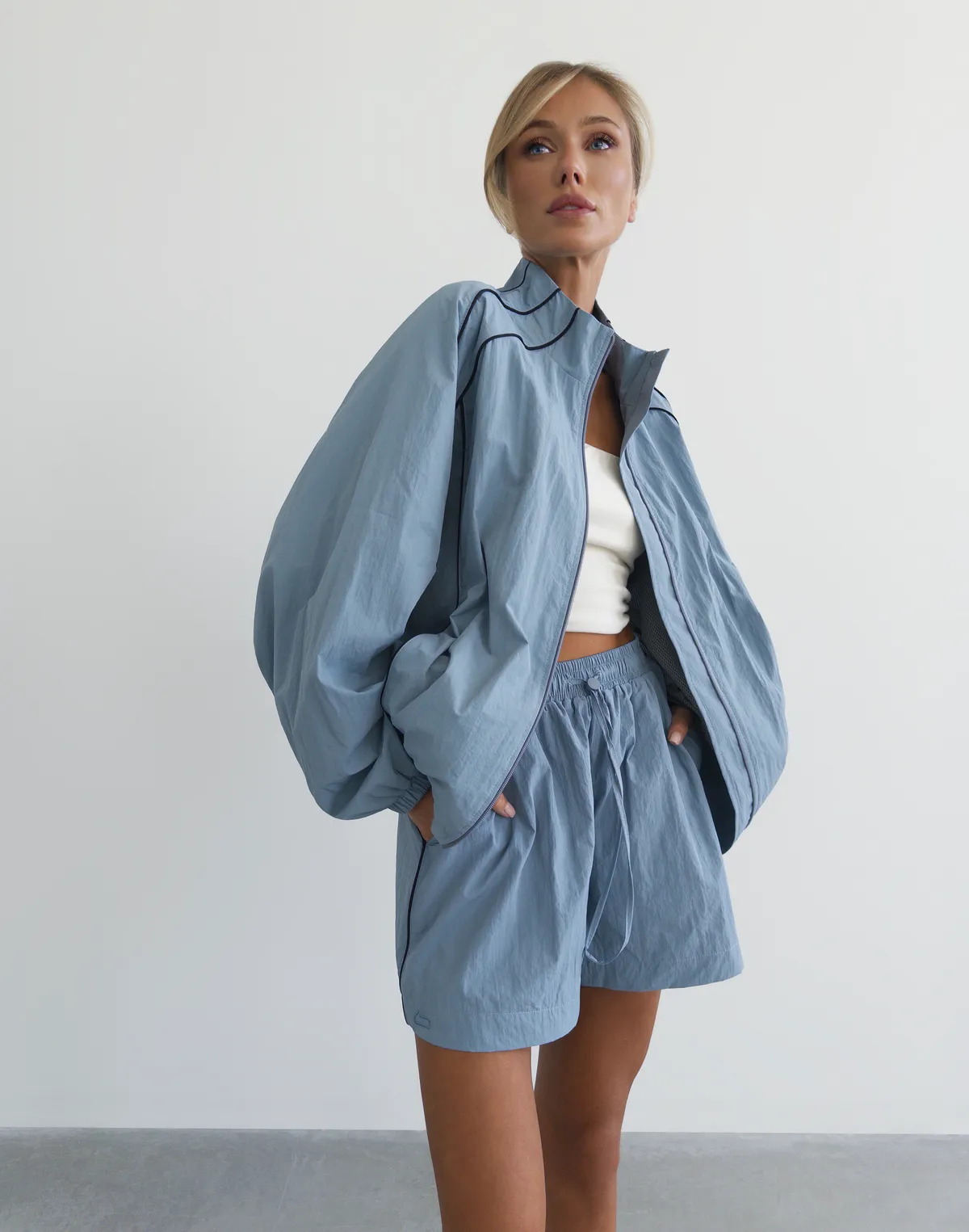 Зіпер з кантом з плащової тканини, блакитний - Фото 1