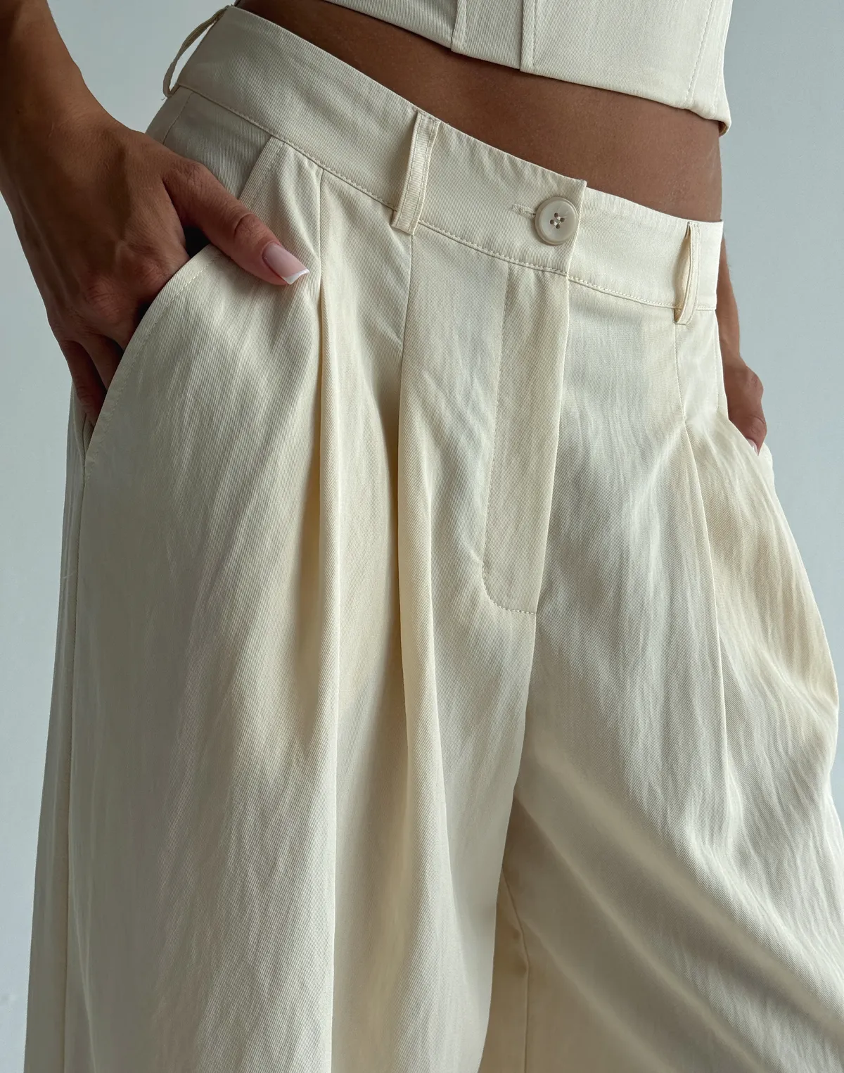 Штани базові з регульованим низом на затяжці, кремові - Фото 5